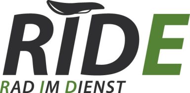 Logo von RIDE, featuring the text "RIDE" mit einem Fahrrad-Symbol.
